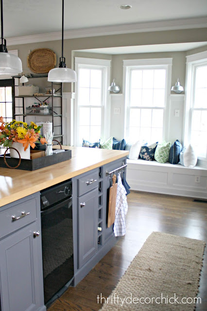 Window seat in bay window with lights