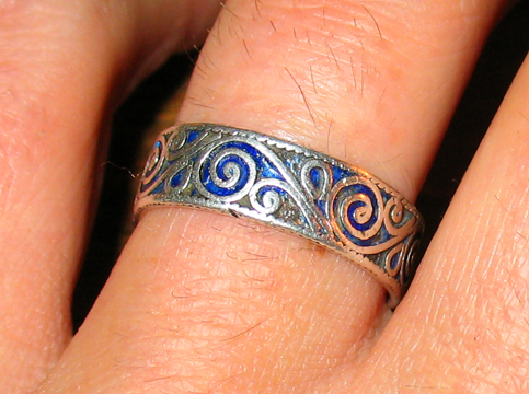 1 Our wedding rings are silver filigree with lapis lazuli melted between