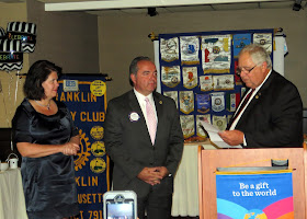Terry Katsaros (Rockland Trust) (center in photo) was recently installed as the new President of the Franklin Rotary Club for 2016-17 by fellow Rotarian Dan Gentile.  Observing is Mr Katsaros's wife Laurel.