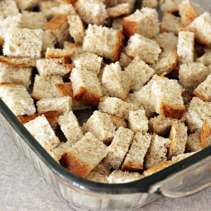 Bread cubes in pan