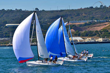 J/70 one-design sailboats- sailing Hot Rum in San Diego