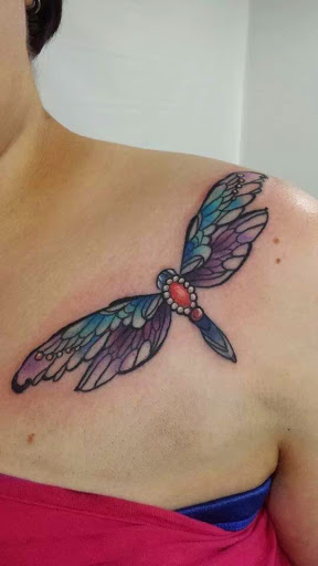unusual dragonfly tattoos