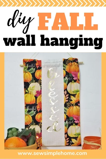 Create your own diy fall wall hanging and learn how to make a fabric wall hanging with a dowel.