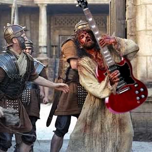Jesús de Nazaret rocking. Cristo tocando la guitarra eléctrica, posiblemente el solo de la canción Stairway to heaven, de Led Zeppelin | Ximinia