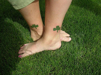 Pictures Of 4 Leaf Clover Tattoos girls tattoos on feet with shamrock tattoo 