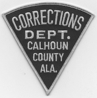 Sleeve patch reading Corrections Department Calhoun County Alabama