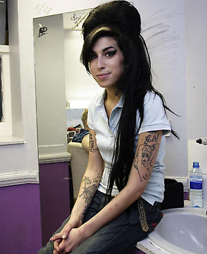 Sexy girl tattoo on her left upper