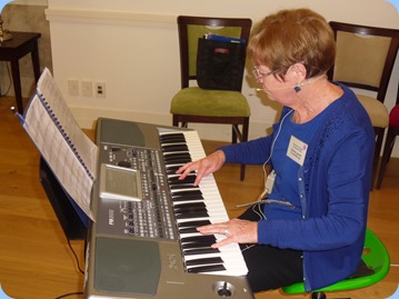 Our Events Manager, Diane Lyons playing her Korg Pa900.