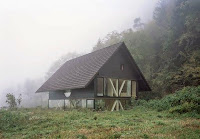 A Simple Barn Shaped House Design In Blasthal Switzerland