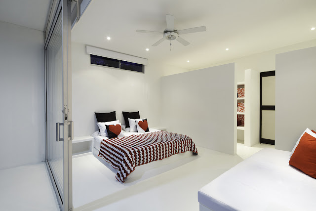 Minimal master bedroom with large bed 