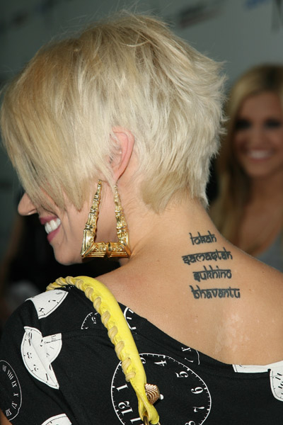 Kimberly Wyatt has a couple of tattoo designs, including a small gecko 