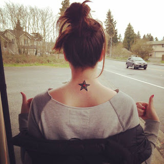 colorful single star tattoo designs on on neck backside