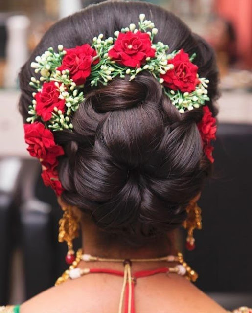 30+ Messy Bridal Bun Hairstyles with Flowers for Wedding - WallpaperDPs