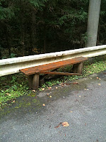 Bench just beside the windy, narrow roadside!