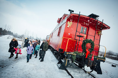 Santa’s Red CabooseRolls Into New Haven