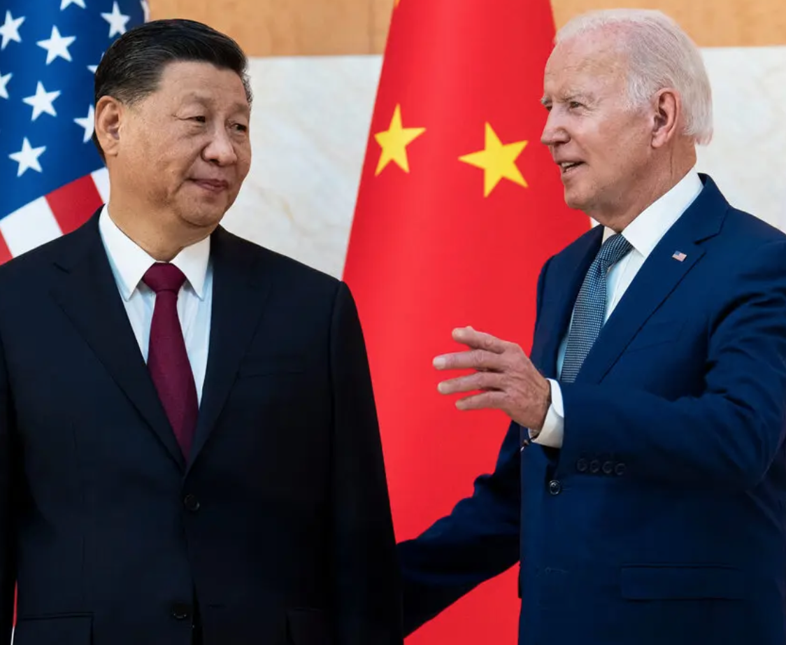 Biden goes for power-positioning of the hands, but what captures my eye is the expression on Xi's face.