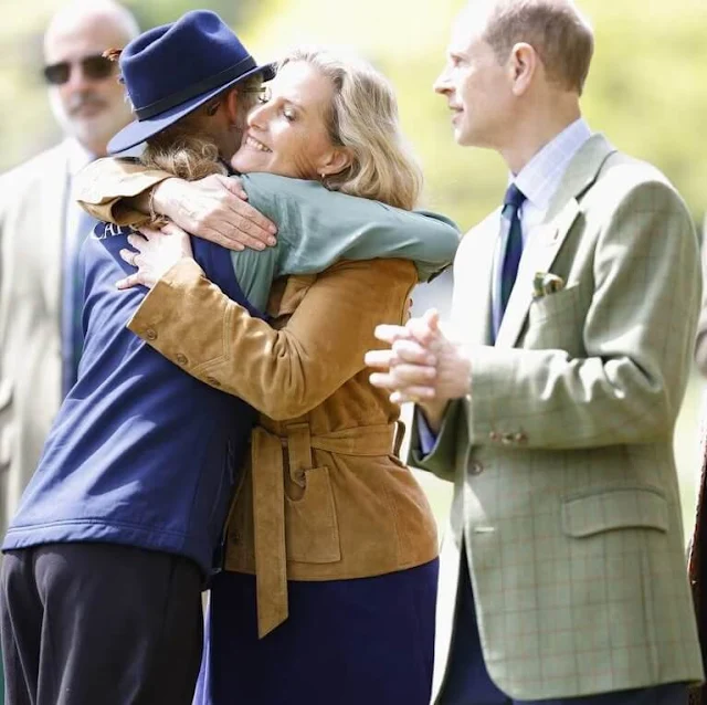 The Duchess of-Edinburg wore a suede Tawnie biker jacket by Paige, and Victoria stretch corduroy dress by Aspiga London