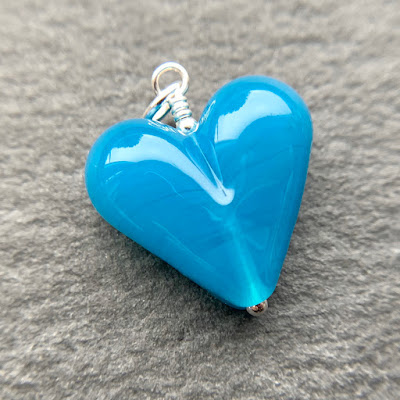 Handmade lampwork glass heart bead pendant by Laura Sparling made with CiM Surf's Up