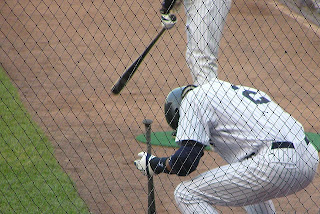 Jeter crouching before an at-bat.