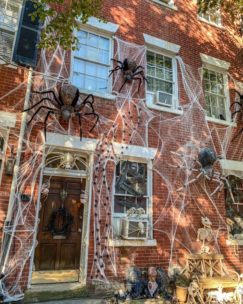 home decorated with spiders and spider web