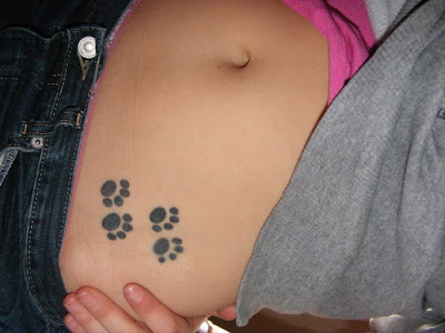 tattoos on girls sides. girls side tattoos with paw