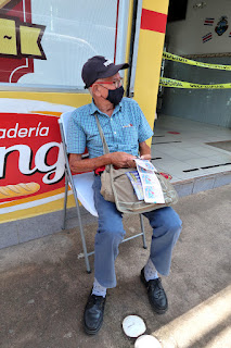 Man selling lottery tickets in Puriscal