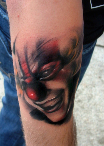 The first of my clown tattoos is this stunning cool tattoo design on the 