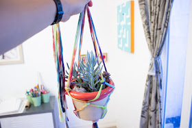 how to make easy DIY Macrame Plant Holders from old tie dye T-shirt fabric yarn, the perfect summer craft for the whole family (kids too!)