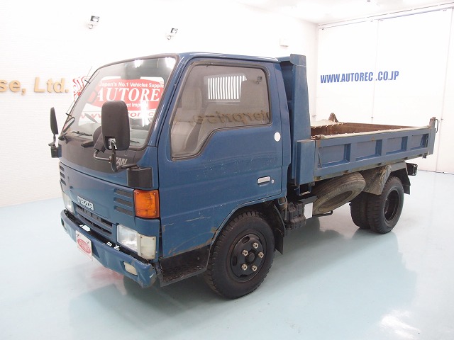 19550T1N8 1997 Mazda Titan 2ton dump high deck for PNG to Oro Bay