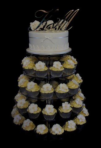 Beautiful cake and cupcake tower to celebrate a wedding