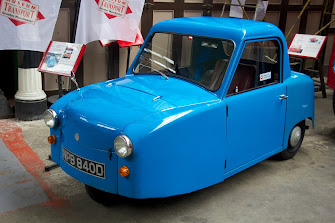 A picture of a blue Ac Accedes invalid carriage