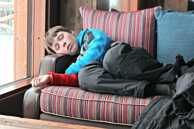 Boy sleeping on sofa