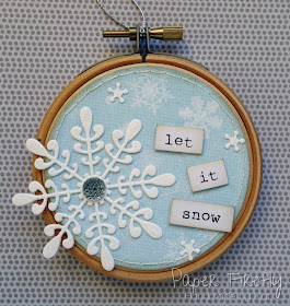 Snowflake decorated embroidery hoop