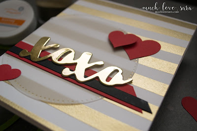 This handmade card features a stamped and heat embossed golden striped background, along with a beautiful gold mirror Lovely Words Card Stock sticker for for the sentiment.  Perfect for a Valentine or anniversary card for your sweetheart. 