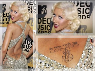 Xtina who inked her nickname on the back of her neck has plenty of 