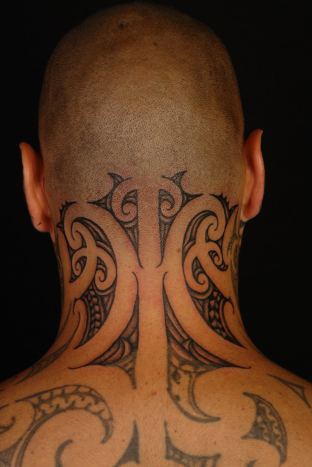 angel wings neck tattoo