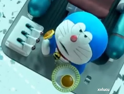 gambar doraemon makan