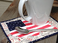 http://trilliumdesign.blogspot.com/2012/06/4th-july-flag-map-mug-rug-pattern.html