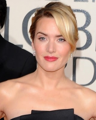  award recipient wore her blond coif in a French twist 