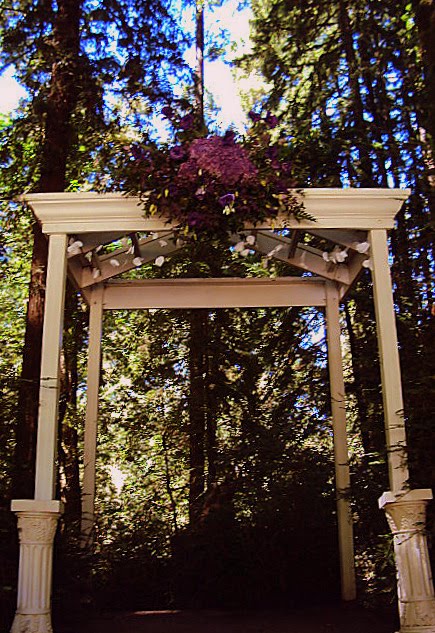 I hung buckets filled with purple hydrangea from the chairs and made a spray