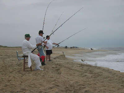 Richard Eller, Wayne Eller, and Jonathan Eller surf fishing at Avon, NC