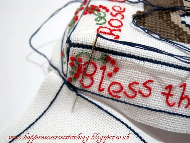 Cross stitched cottage with french knots a tutorial showing how to finish into a mattress pincushion