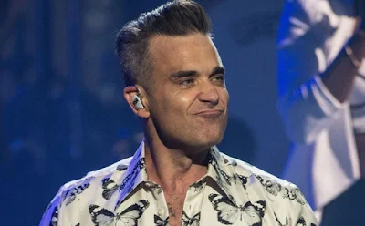 Robbie Williams song was inspired by his paranormal experiences planet-today.com