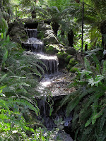 waterfall on left of bridge