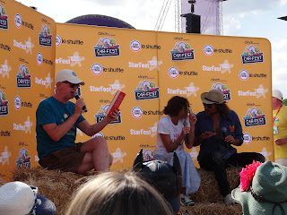 Chris Evans interviewing Minnie Driver and Russell Brand, CarFest South, 2022