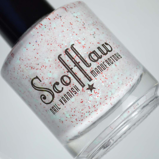 white nail polish with glitter in a bottle