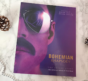 paperback copy of the queen Bohemian Rhapsody film book