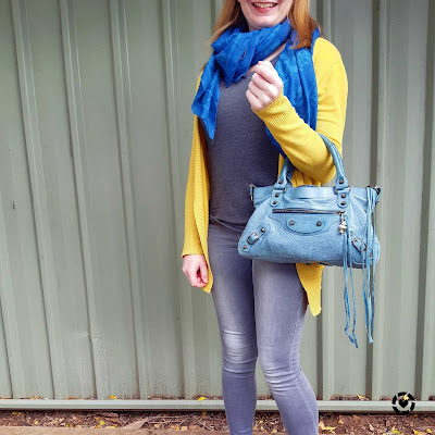 awayfromblue Instagram mustard cardigan and teal and turquoise skull scarf and Balenciaga first bag