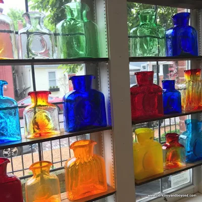 colorful bottles in the window at Helen Winnemore's in German Village in Columbus, Ohio