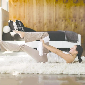 Single leg stretch with a Towel